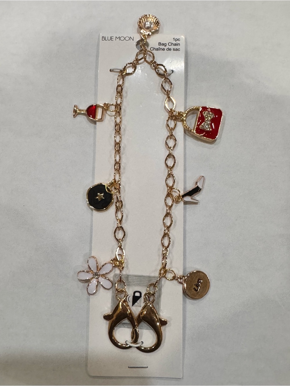 Sexy Gold-Tone bag charms.
